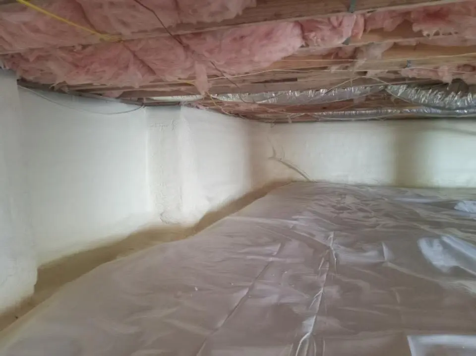 Crawl space encapsulation with closed-cell spray foam for Commercial Roof Restoration in Hopkinton